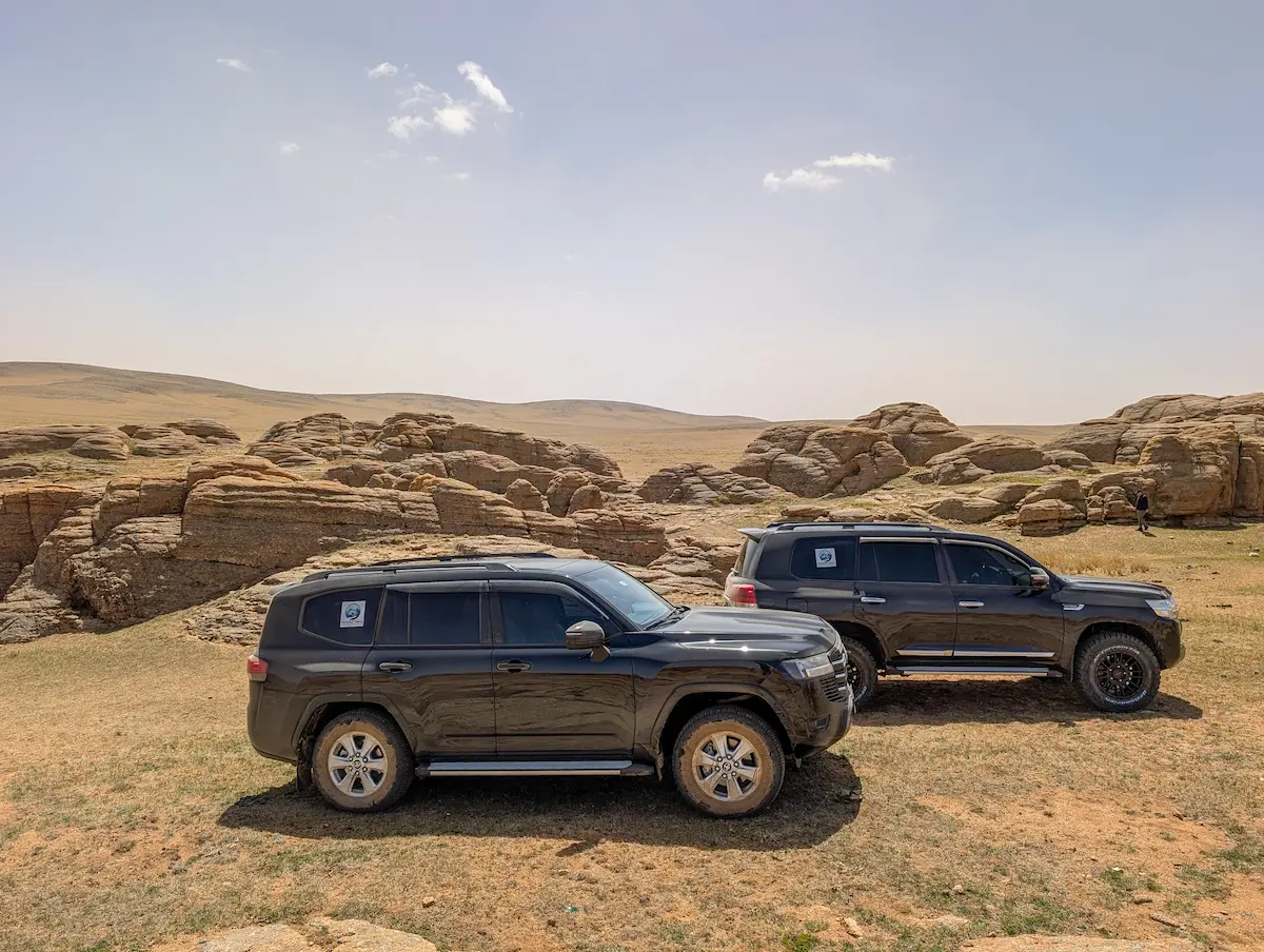 Private Mongolia tour with two Toyota Land Cruisers at Baga Gazriin Chuluu rock formations, Middle Gobi